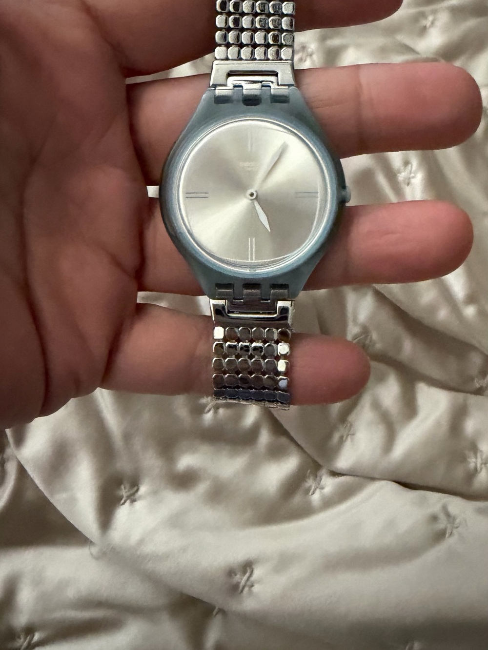 Swatch Silver Dial Watch with Light Blue Case and Silver Bracelet